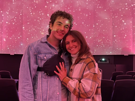 Couple inside planetarium