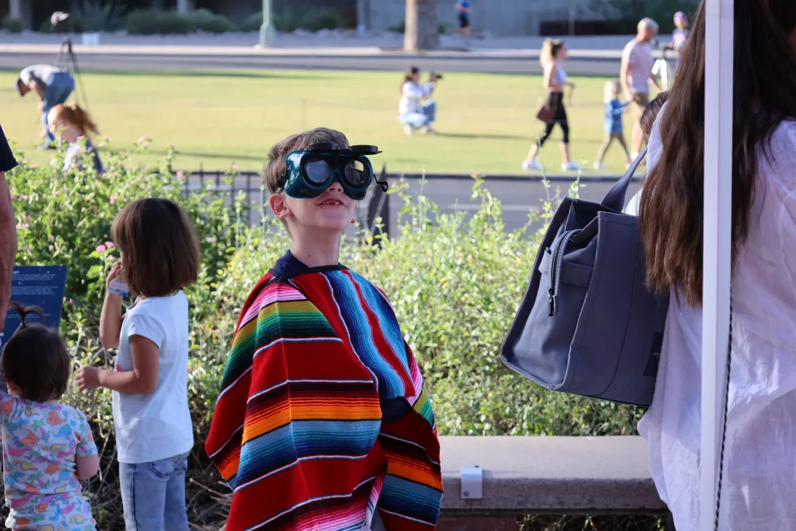 Kid with Eclipse goggles